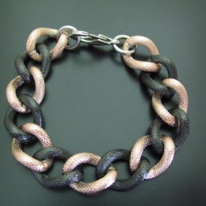 BRAZALETE ACERO NEGRO Y AMARILLO